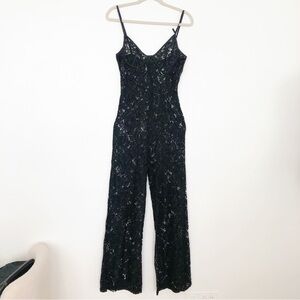 Naked Wardrobe Black Lace Jumpsuit